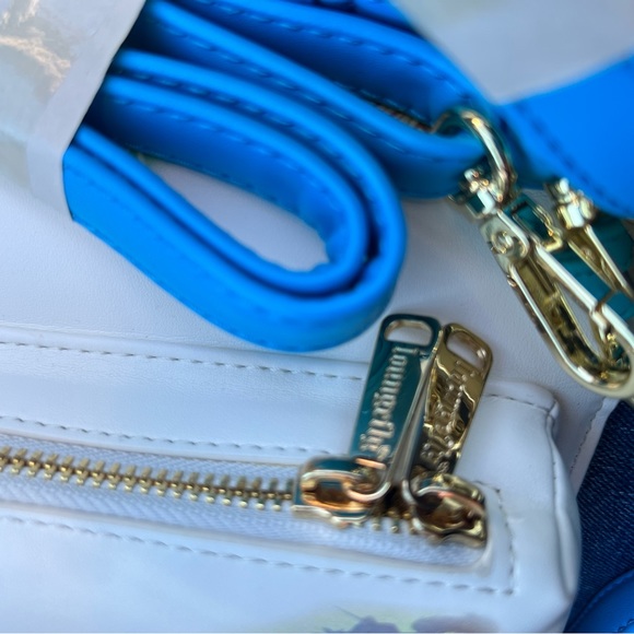 New Loungefly Pinocchio Storybook Convertible Backpack & Crossbody Bag - Picture 9 of 15